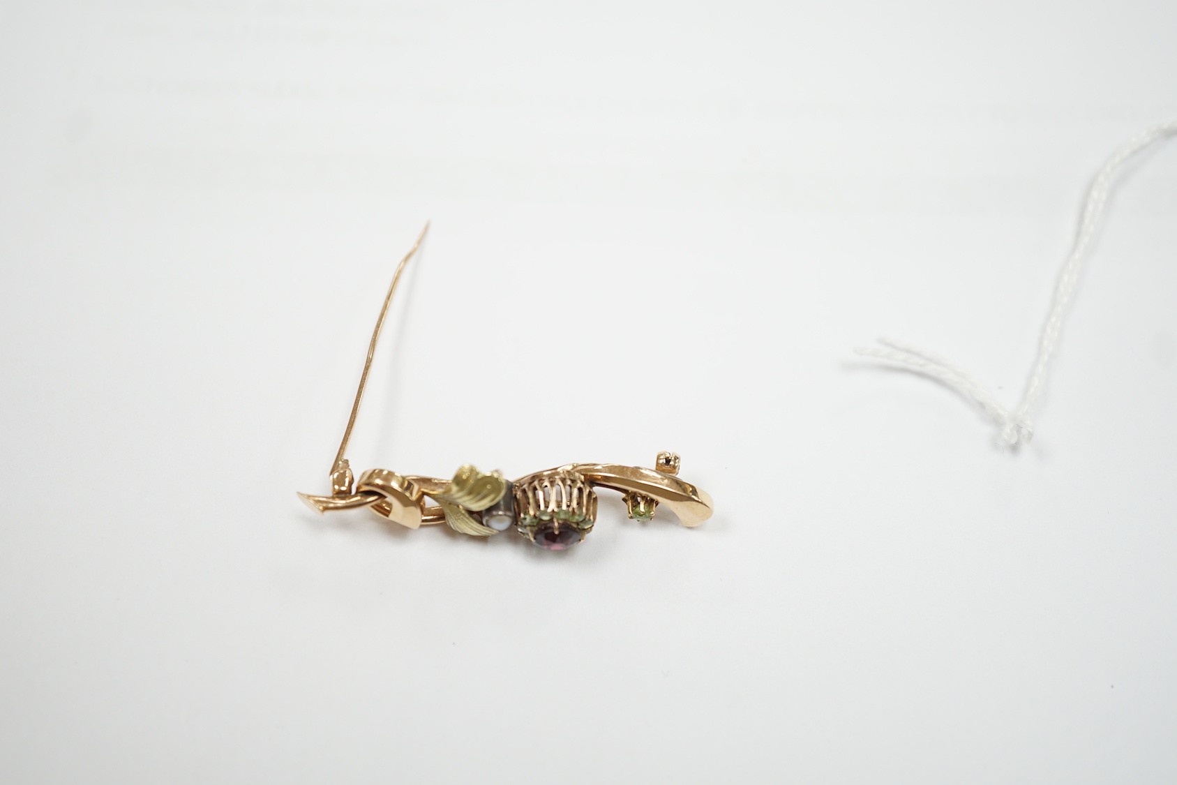 An early to mid 20th century Russian 56 zolotnik yellow metal, garnet? and split pearl set foliate brooch, 48mm, gross 4.3 grams.